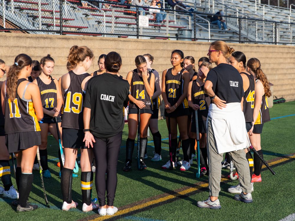 Coach with the team